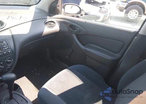 2000 Ford Focus Lx z USA, uszkodzony, nr VIN 1FAFP33P8YW335263